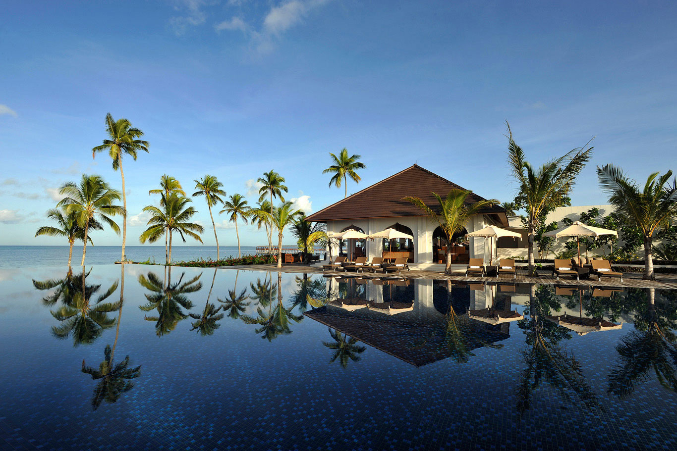 Resort infinity pool facing the ocean